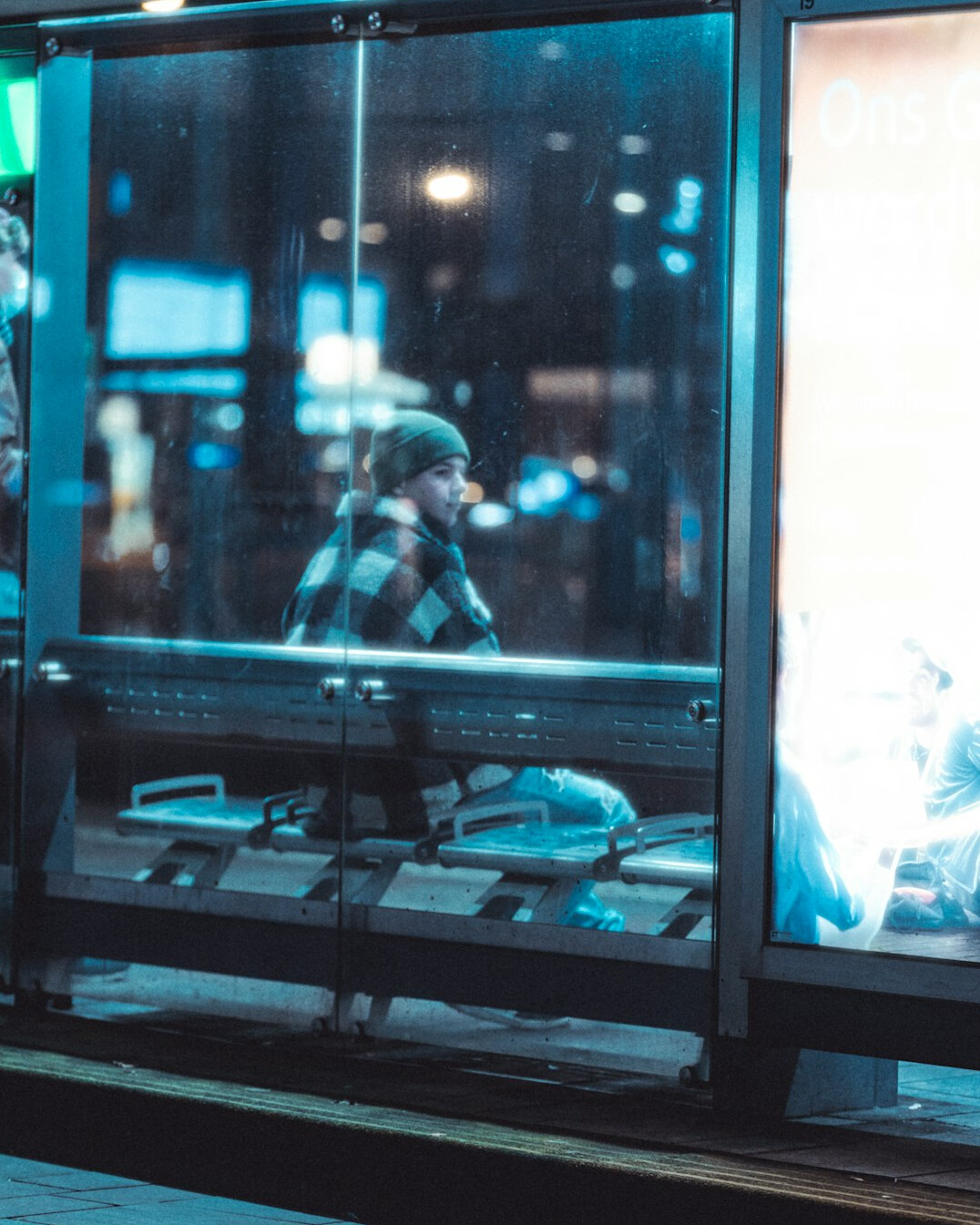 Commuters waiting at a bus stop in Santiago Chile